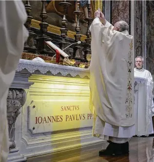  ??  ?? Pope Francis celebrates a Mass for the 100th anniversar­y of the birth of Pope John Paul II, in St. Peter’s Basilica, on May 18. The Mass was in the chapel where the grave of John Paul II is located.