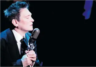  ?? MATTHEW MURPHY/ O& M CO/ THE ASSOCIATED PRESS ?? Alt- country superstar k. d. lang performs in the musical After Midnight at the Brooks Atkinson Theatre in New York. Lang says making her Broadway debut was a dream come true. The singer’s one- month stint ended last Sunday.