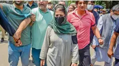  ?? — PTI ?? Former J&K chief minister & People’s Democratic Party president Mehbooba Mufti with party leaders, during a protest on the 2nd anniversar­y of abrogation of Article 370 in Srinagar on Thursday.