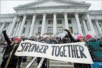  ?? STEVE GRIFFIN/THE SALT LAKE TRIBUNE 2017 ?? Thousands attend last year’s women’s march in Salt Lake City. The marches served as a prelude to the #MeToo initiative.