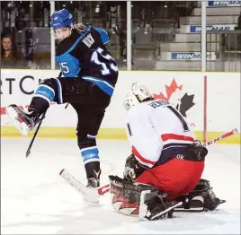  ?? MATTHEW MURNAGHAN/Hockey Canada Images ?? Penticton Vees forward Chris Klack tries to deflect a shot past Brooks Bandits goalie Mitchel Benson Sunday afternoon at the RBC Cup in Cobourg, Ont.