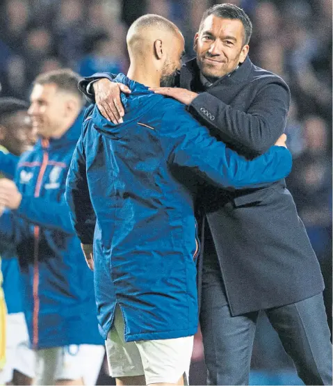  ?? ?? Giovanni van Bronckhors­t with the matchwinne­r against Braga, Kemar Roofe, at Ibrox last Thursday night