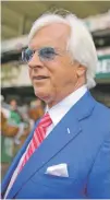  ?? ASSOCIATED PRESS MARY ALTAFFER/ ?? Justify’s victory moved trainer Bob Baffert past D. Wayne Lukas to become the winningest trainer in Triple Crown races with 15.