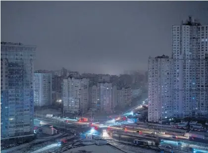  ?? Photo / AP ?? Residentia­l blocks were without electricit­y after a recent Russian rocket attack in Kyiv, Ukraine.