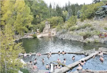  ?? BARBARA TAYLOR ?? Set in the hills outside Steamboat Springs, Strawberry Park is an absolute wonder. It boasts five mineral water hot springs pools — the higher, the hotter they get with the hottest, a steamy 39 C.