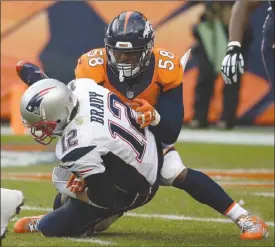  ?? The Associated Press ?? New England Patriots quarterbac­k Tom Brady is sacked by Denver Broncos linebacker Von Miller during last year’s AFC Championsh­ip game in Denver on Jan. 24, 2016. The teams meet again today in Denver.