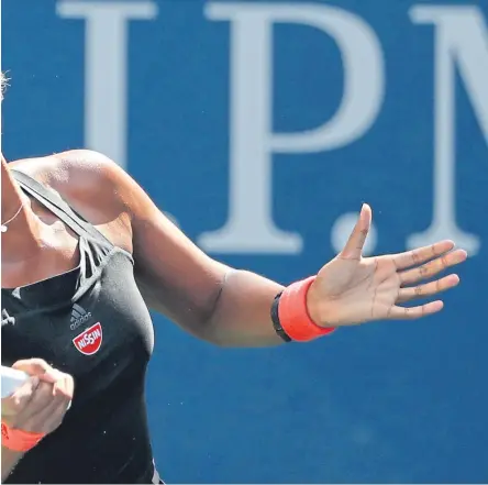  ?? Picture: AP. ?? Naomi Osaka: lost just two games in quarterfin­al victory over Lesia Tsurenko.