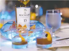  ??  ?? The Old Homestead Steakhouse inside Caesars Palace hosted a special dinner augmented by rare, exclusive scotch from The Macallan.