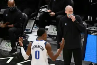  ?? AP PHOTO/PAUL BEATY ?? Dallas Mavericks head coach Rick Carlisle and Josh Richardson (0) argue with referees after Richardson was called for a foul during the second half of an NBA basketball game against the Chicago Bulls, Jan. 3, in Chicago.