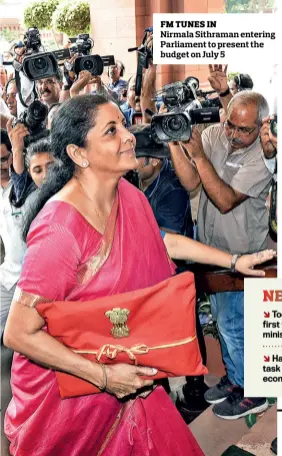  ?? VIKRAM SHARMA ?? FM TUNES IN
Nirmala Sithraman entering Parliament to present the budget on July 5