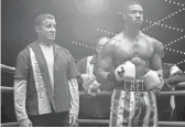  ??  ?? Sylvester Stallone (left) and Michael B. Jordan return in “Creed II,” the latest entry in a franchise that began with “Rocky.”