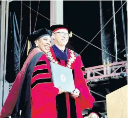  ?? ?? Jonathan Holloway, president of Rutgers, The State University of New Jersey, presents the honorary doctorate of fine arts to Dr Sheryl Lee Ralph.