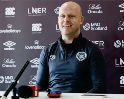  ?? ?? Hearts manager Steven Naismith speaks with the press yesterday ahead of the game at Kilmarnock