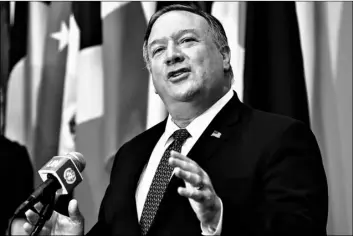  ?? Mike Segar/Pool via AP ?? In this on Thursday file photo, Secretary of State Mike Pompeo speaks to reporters following a meeting with members of the U.N. Security Council, at the United Nations.