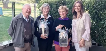  ??  ?? Ray (left) and Kathryn Waters (right) present the trophies to Kay Thompson and Zdenka Better; Absent: C grade winner Noel Mackenzie.