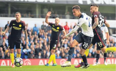  ?? Picture: PA. ?? Dele Alli drives in Tottenham’s second goal in the 2-0 victory over Manchester City at White Hart Lane.