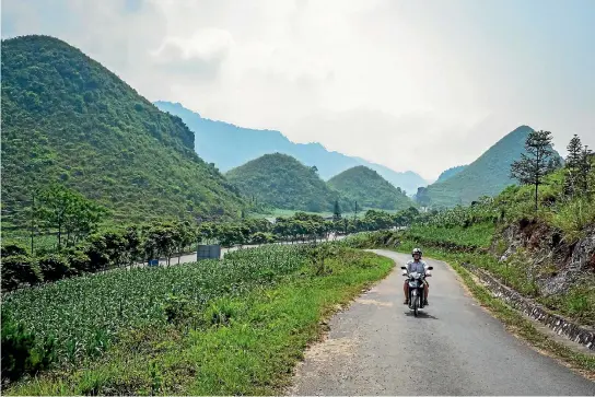  ?? KIT YENG CHAN ?? Riding Vietnam’s Ha Giang motorbike loop is best done at a leisurely speed.
