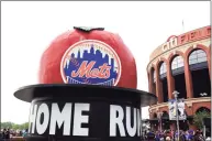  ?? Tim Clayton / Corbis via Getty Images ?? The home run attraction outside Citi Field during the New York Mets and Arizona Diamondbac­ks game in New York in 2012. The Mets’ sale to new owner, hedge fund manager Steve Cohen should bring some credibilit­y to the team after years of ridicule.