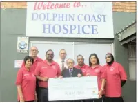  ?? PICTURE: SUPPLIED ?? Retired businessma­n Juggiah Naidoo, front, with members of the Dolphin Coast Hospice Associatio­n at the cheque handover.