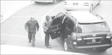  ?? (Photo by Terrence Thompson) ?? Indigenous Peoples’ Affairs Minister Sydney Allicock, who is seen approachin­g his vehicle, was among the government MPs who was not informed in advance of the postponeme­nt of yesterday’s sitting of the National Assembly.