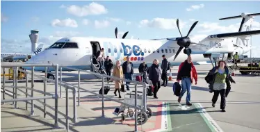  ?? File/agence France-presse ?? Passengers disembark from a Flybe aircraft at Jersey Airport, Britain.