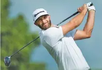  ?? THE ASSOCIATED PRESS ?? Dustin Johnson tees off on the 17th hole during Saturday’s third round of the Canadian Open at Glen Abbey Golf Club in Oakville, Ontario. Johnson shot a 65 and was tied with Byeong Hun An, Whee Kim and Kevin Tway for the lead.