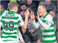  ??  ?? James Forrest and Callum McGregor celebrate the latter’s goal against Hearts in midweek