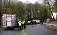  ?? TANIA BARRICKLO — DAILY FREEMAN FILE ?? NOV. 18: Emergency vehicles are parked on Delaware Avenue in Kingston near where a Katherine Vollmer, a 20-year-old SUNY New Paltz student, fell 150 feet to her death off a cliff in Hasbrouck Park.