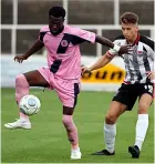  ?? ?? Joe Raynes closes down a Dulwich player in 2018