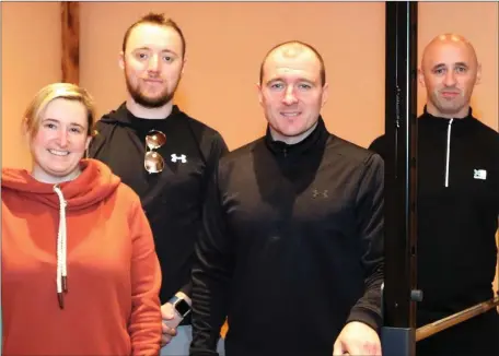  ??  ?? Enjoying the open day in RossFit gym in Woodbine Industrial Estate were (from left) Sinead O’Brien and Tomas Moran with managers Emmett Doherty and Brian Mullett