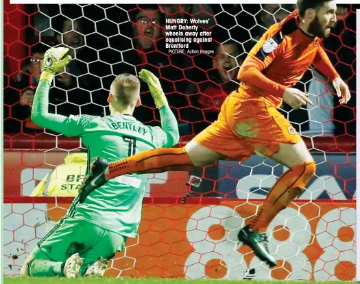  ?? PICTURE: Action Images ?? HUNGRY: Wolves’ Matt Doherty wheels away after equalising against Brentford