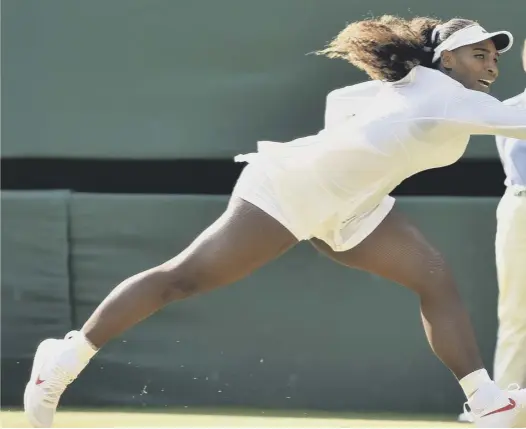  ??  ?? Serena Williams is at full stretch yesterday on her way to victory over Kristina Mladenovic and a place in the fourth round