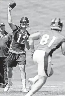  ?? ISAIAH J. DOWNING, USA TODAY SPORTS ?? Paxton Lynch, above, who hopes to supplant Trevor Siemian as the Broncos starter, was 6-for-9 in the preseason opener.