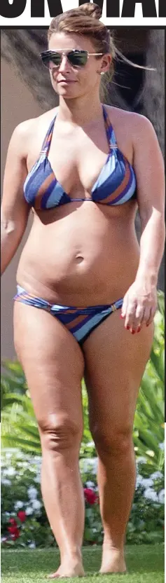  ??  ?? On holiday: Pregnant Coleen Rooney in Majorca