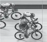  ?? ASO VIA AP ?? German sprinter Marcel Kittel, bottom right, crosses the finish line ahead of Norway’s Edvald Boasson Hagen, top right, to win the seventh stage of the Tour de France on Friday.