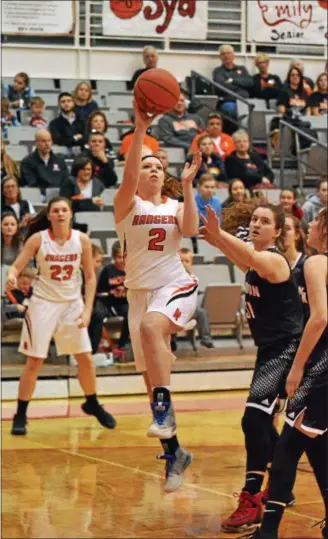  ?? PAUL DICICCO — THE NEWS-HERALD ?? North’s Taylor Valaitis shoots during the Rangers’ victory over Chardon on Feb. 26 at Perry.