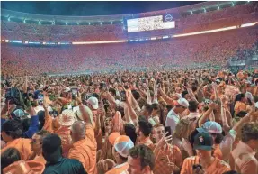  ?? JAMAR COACH/NEWS SENTINEL ?? After fans stormed the field after Tennessee’s win over Alabama in Neyland Stadium, on Oct. 15, the school was fined $100,000.