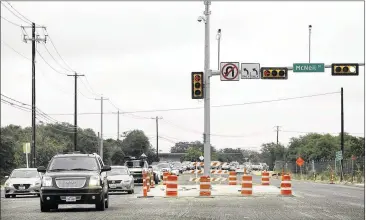  ?? JAY JANNER / AMERICAN-STATESMAN ?? Funding from last year’s Propositio­n 1, which steers some gas and oil tax revenue toward roads, paid for adding lanes at RM 2222 and McNeil Drive in Northwest Austin. A measure on the Nov. 3 ballot, Propositio­n 7, would send some sales tax revenue to...