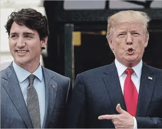  ?? SEAN KILPATRICK THE CANADIAN PRESS FILE PHOTO ?? U.S. President Donald Trump said that after Trudeau told him the U.S. does not have a trade deficit with Canada, he replied, “Wrong, Justin, you do.”