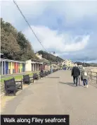  ??  ?? Walk along Filey seafront