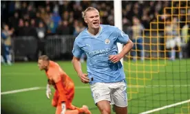  ?? DeFodi Images/Getty Images ?? Erling Haaland celebrates after his penalty gives Manchester City a 2-1 lead. Photograph: