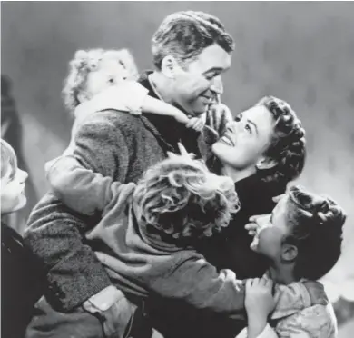  ?? ASSOCIATED PRESS ?? James Stewart starred with Donna Reed in Frank Capra’s 1946 holiday classic, “It’s a Wonderful Life.” The film has aired on television during the holiday season for decades.