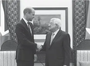  ?? JOE GIDDENS / WPA POOL / GETTY IMAGES ?? Prince William meets Palestinia­n Authority President Mahmoud Abbas in Ramallah on Wednesday, becoming the first member of the Royal Family to visit the territorie­s.