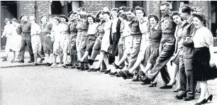  ??  ?? ■ Residents of Tamworth Road, Newcastle, celebrate VE Day in 1945