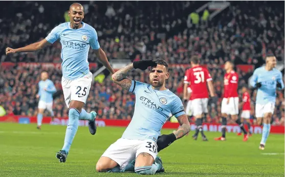  ?? Picture: AP. ?? Nicolas Otamendi salutes the Manchester City fans after netting what proved to be the winner at Old Trafford.