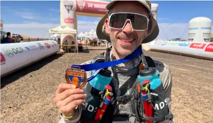  ?? Picture: Rick Cross ?? SUCCESS: Rick Cross at the finish line of the Marathon des Sables