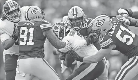  ?? DAN POWERS/USA TODAY NETWORK-WISCONSIN ?? Green Bay Packers nose tackle Kenny Clark (97) sacks Washington quarterbac­k Dwayne Haskins (7) on Sunday at Lambeau Field.