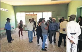  ?? Pictures: SIYAVUYA MZANTSI ?? HISTORY: Journalist­s gather in the small cottage which once housed Mandela and is now used as an office.