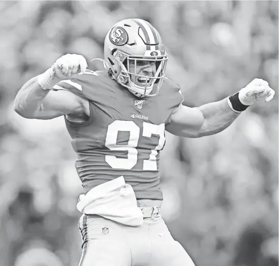  ?? KYLE TERADA/USA TODAY SPORTS ?? 49ers defensive end Nick Bosa celebrates a sack of Packers quarterbac­k Aaron Rodgers in the NFC championsh­ip game.