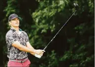  ?? Tim Nwachukwu / Getty Images ?? Morgan Hoffmann of the United States plays his shot from the 12th tee during the first round of Travelers Championsh­ip at TPC River Highlands on Thursday in Cromwell.